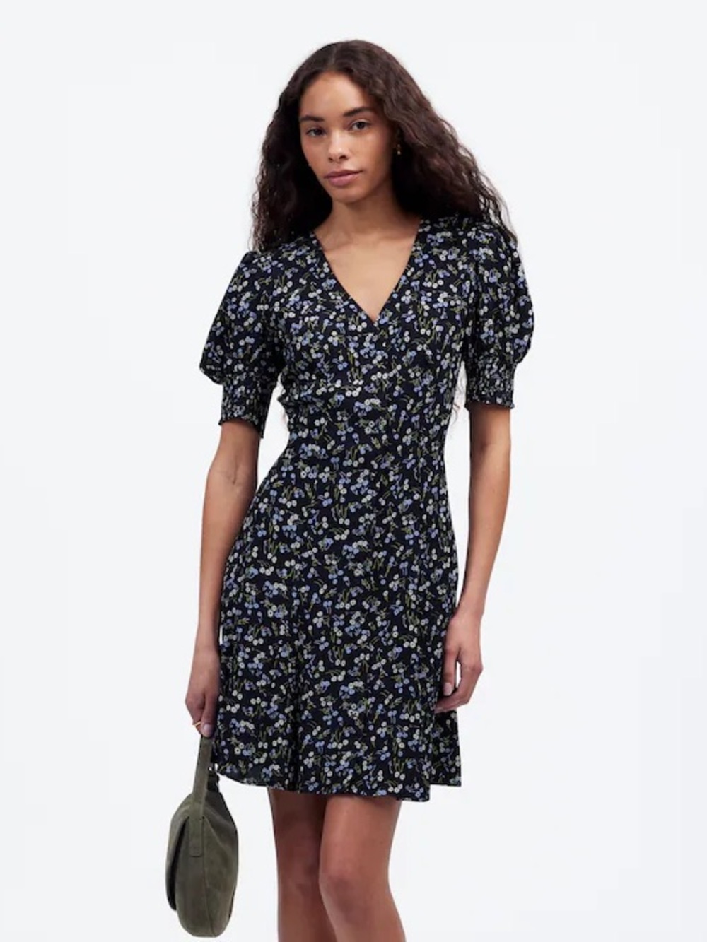 Madewell navy floral v-neck mini dress with elastic waist and puff sleeves.